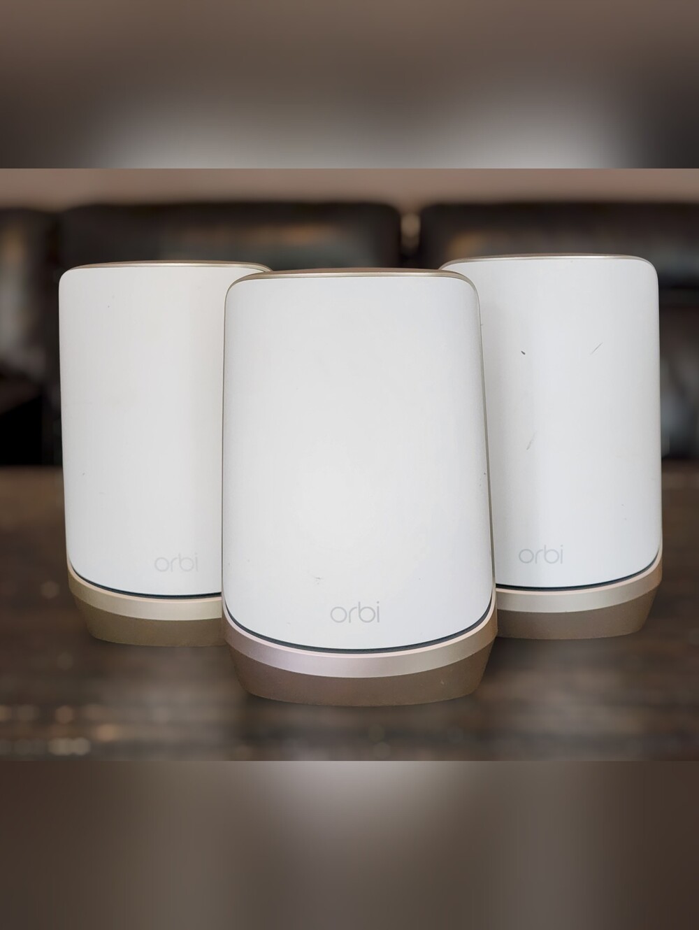 Netgear Orbi Quad-Band WiFi 6E Network System — White and Gold Accents
